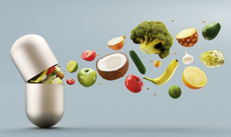a capsule filled with various fruits and vegetables